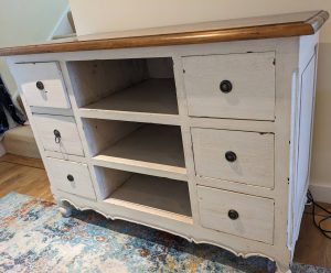 shabby white side table before upcycling
