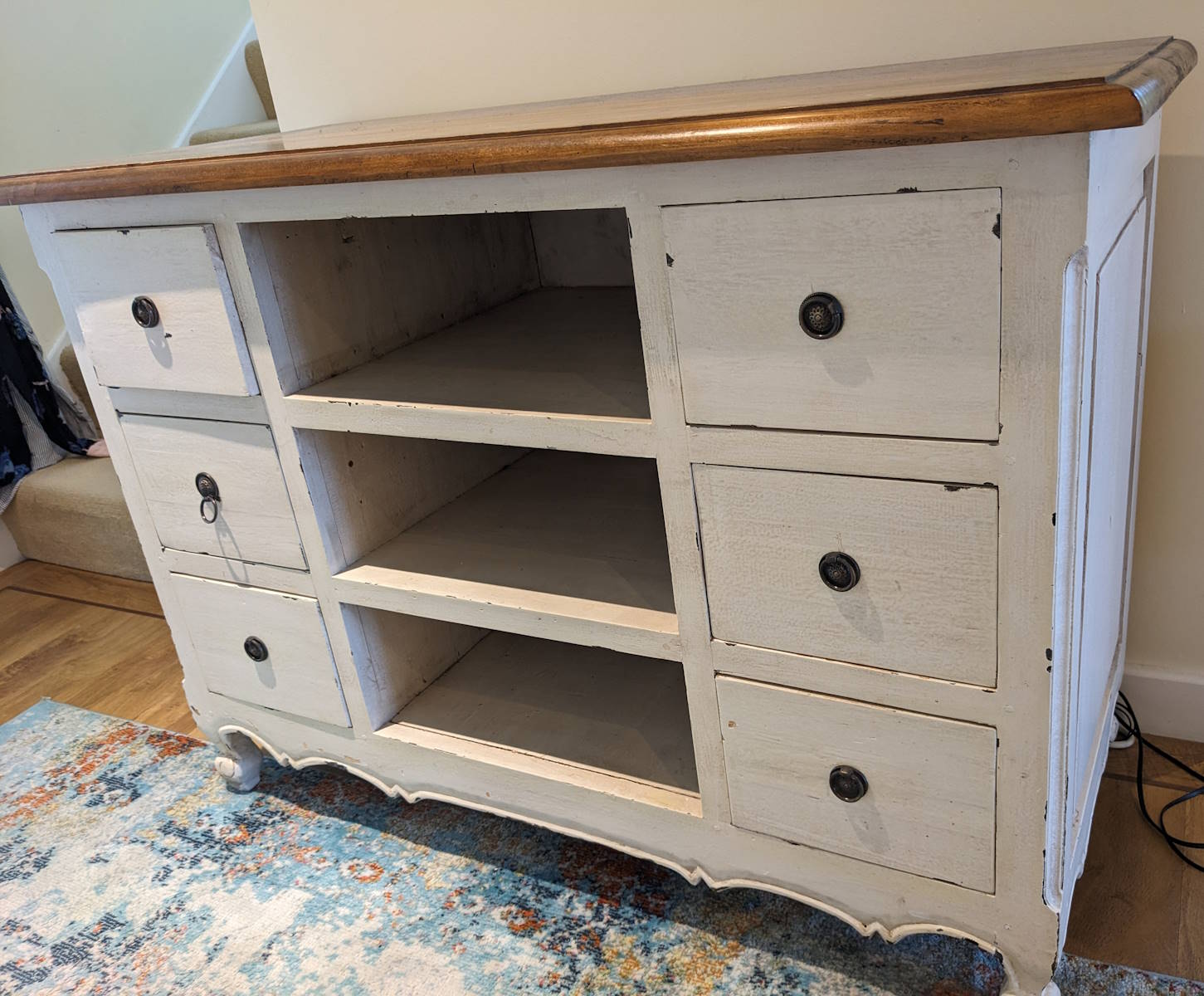 shabby white side table before upcycling