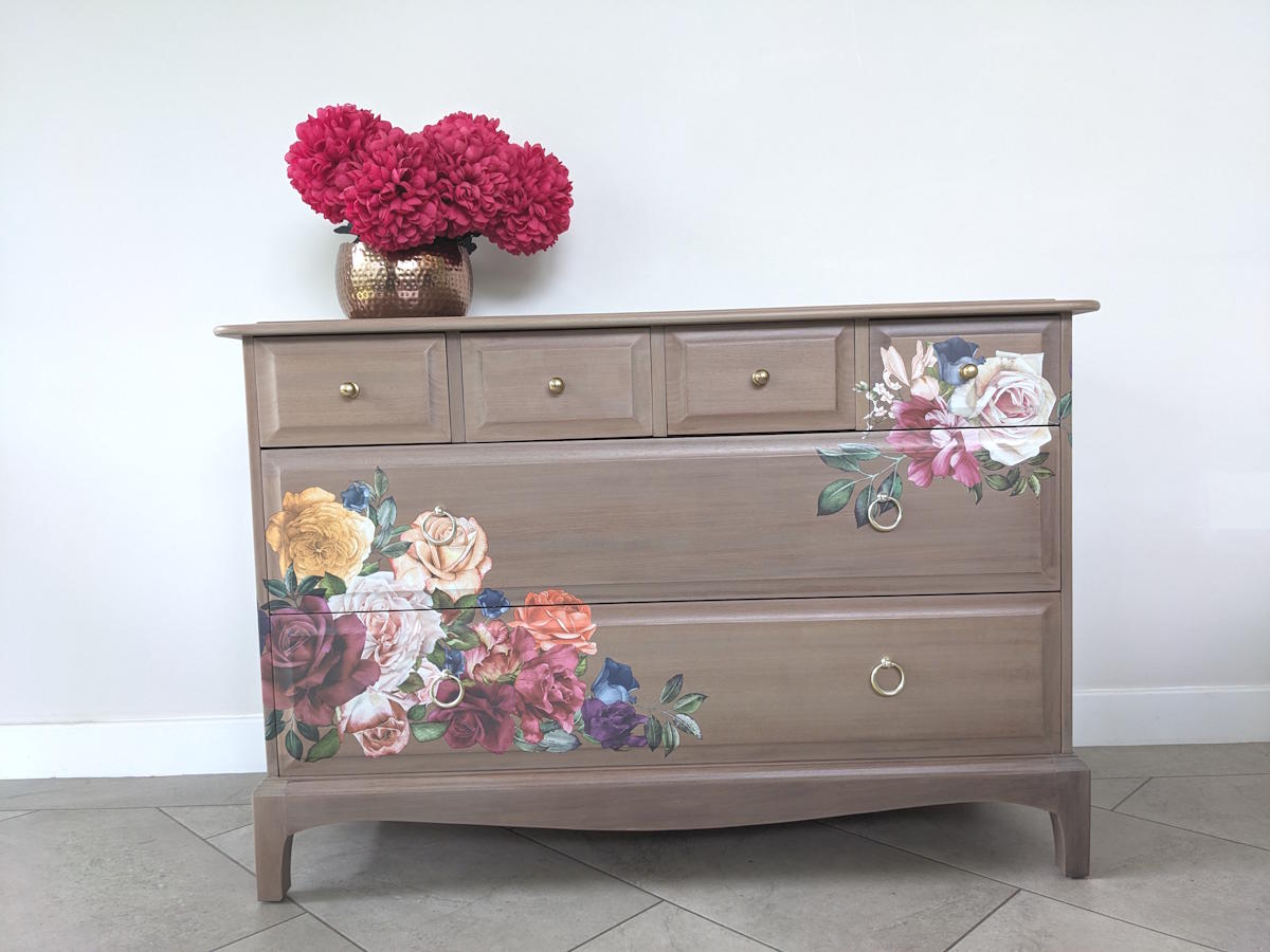 Stag chest of drawers bare wood and floral detail